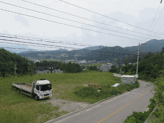 본건 및 주변전경(본건 북동측 인근에서 촬영)