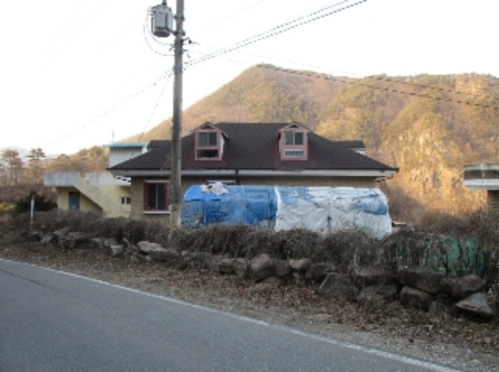 본건