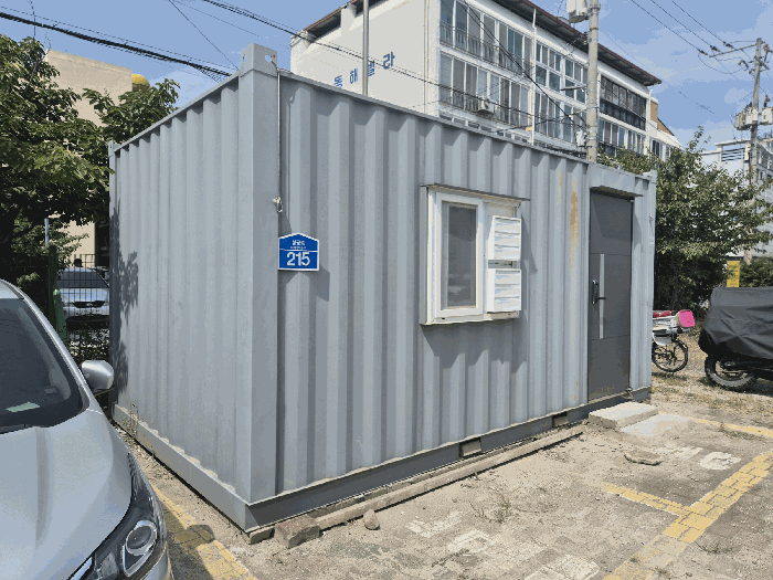 본건 기호(14) 지상 소재 컨테이너