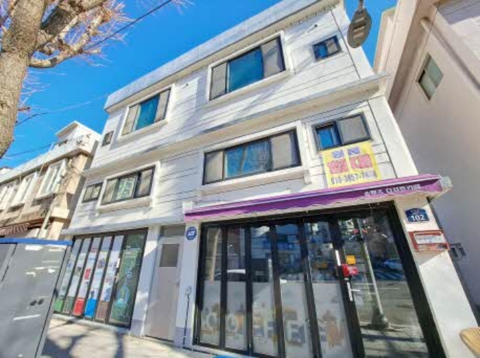 본건 목록7 (신암로 102) 전경(건물왼쪽에서 순차로 980-128,129,13
