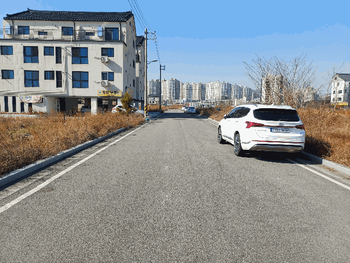 본건 1 북동측 도로 및 주변환경